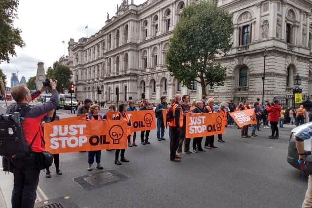 The group met outside Downing Street before marching in the road towards Parliament Square (Credit: Just Stop Oil)