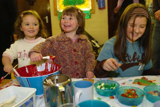 Elysia Ainsworth, three, Abby Barker, three, and Nicola Birch, nine, at Grimsargh Village Hall Christmas fair