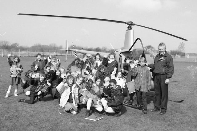 High-flying children at Ingol County Primary School had a chance to get behind the controls of a helicopter which was loaned to them by North Pier Helicopter Rides, Blackpool for their "machine day"