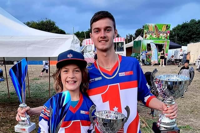 Freddie with his coach Alex Brookes who are both double champions