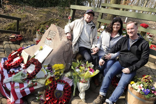 Tony Foulds sat on his beloved memorial with visitors from New York Steven and Tina Bartlett on the 75th anniversary of the Mi Amigo flight disaster