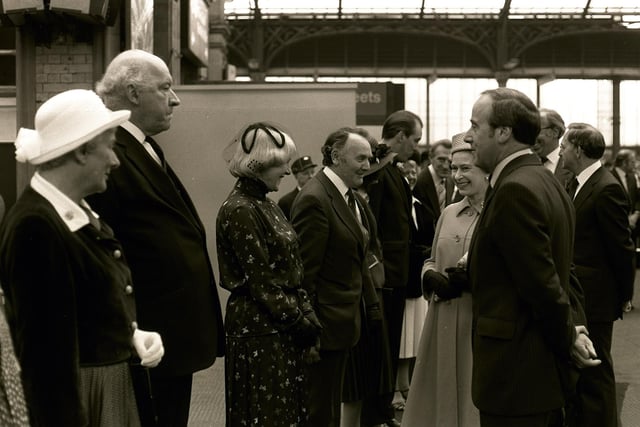 This was when The Queen came to Preston in 1980. The official party including Den Dover MP, fifth from left, welcome the Queen at Preston Station