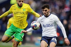 Tom Cannon battles for possession with Norwich City’s Andrew Omobamidele