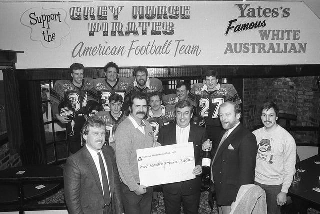 A cheque for £500 has been presented by the Preston Pirates American Football Club to Yates Brothers Ltd to aid leukaemia research. The Pirates, who are sponsored by the Manchester-based company's Preston Grey Horse pub, raised the money when their biggest players pulled a 32-ton truck on a 10-mile tug around the town