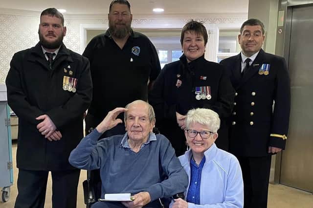 When John woke up on his 100th birthday, he enjoyed a special birthday breakfast before being met with his first surprise guest from the Trafford Veterans. Photo: Ideal Carehomes