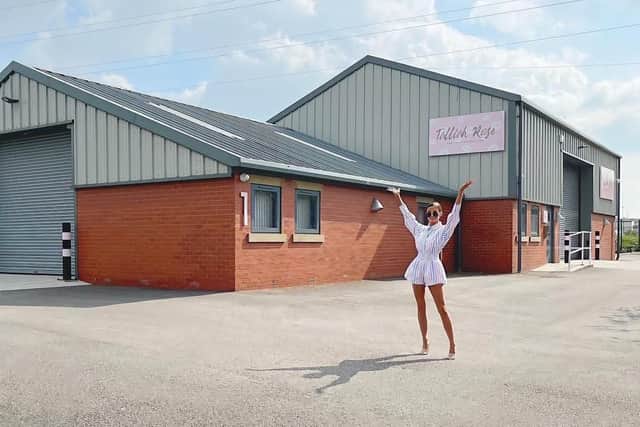 Briony outside her warehouse in Accrington