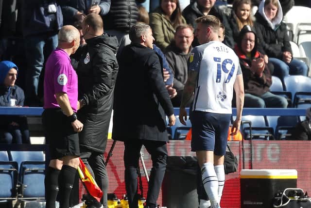 Preston North End manager Ryan Lowe has a word with Emil Riis after the striker's substitution against Queens Park Rangers at Deepdale