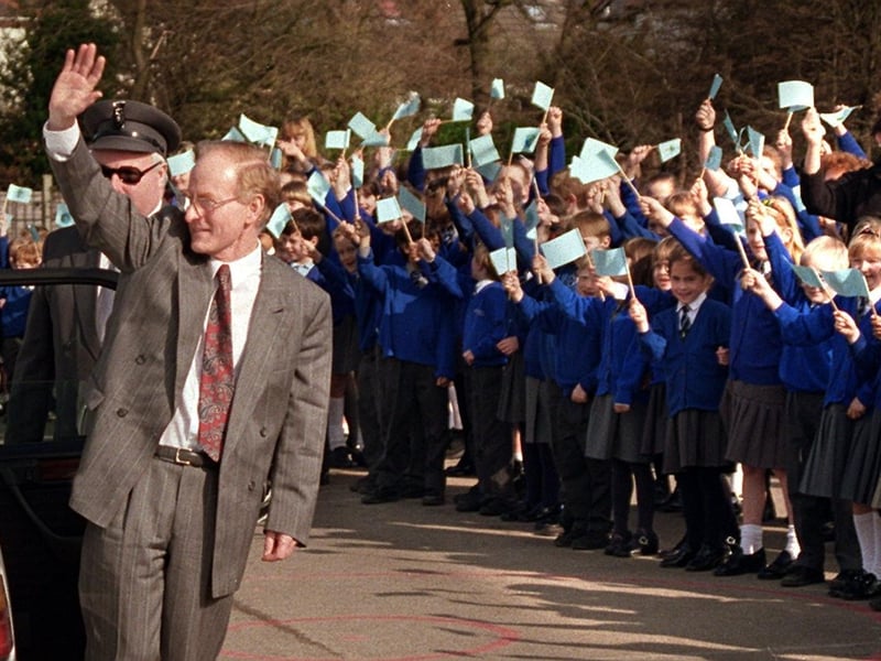 Retiring headmaster Ron Bramwell, of Queens Drive County Primary School, in Preston, gets a royal style send off from pupils at the school