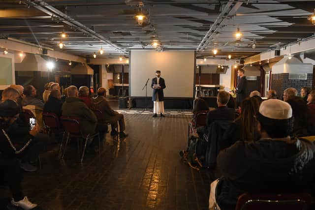 The "service of reflection and peace" was attended by around 100 people