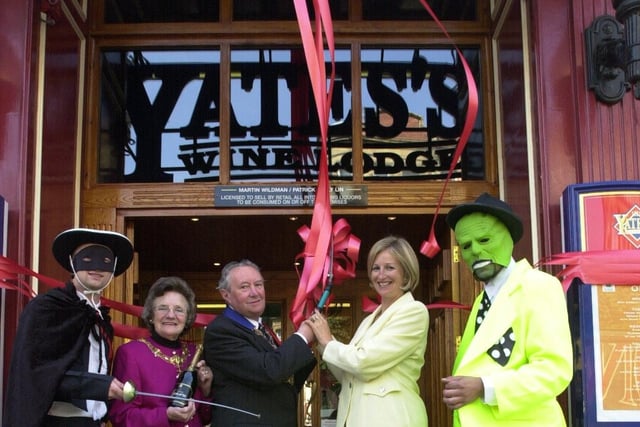 The Mayor and Mayoress of Preston, Coun. Joe and Enid Hood, and Davina Dickson from Yates's Wine Lodge, celebrate the pub chain's 144th birthday party in Preston