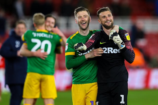 Preston North End's Paul Gallagher and Declan Rudd celebrate after the match