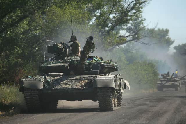 Ukrainian troop move by tanks on a road of the eastern Ukrainian region of Donbas on June 21, 2022.