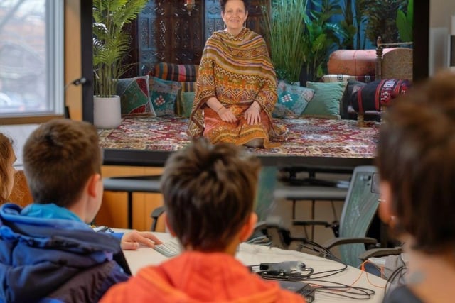 Children watching a Stories for Schools digital library story video