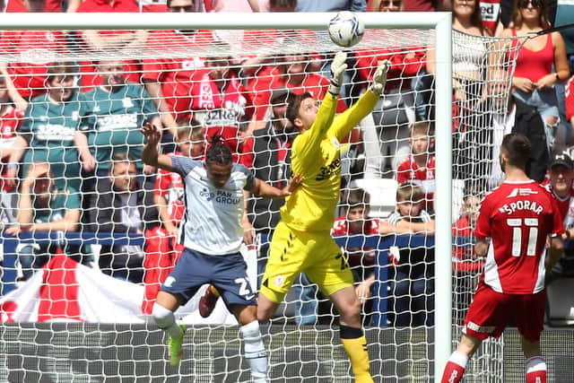 Middlesbrough's keeper Luke Daniels puts the ball into his own net under pressure from Preston North End striker Cameron Archer but it was disallowed