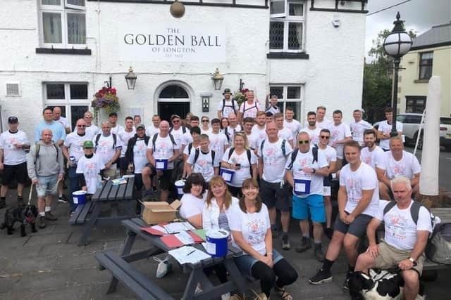Some of the Walmer Bridge FC walkers who took part in the walk in 2019, outside the Golden Ball pub in Longton.