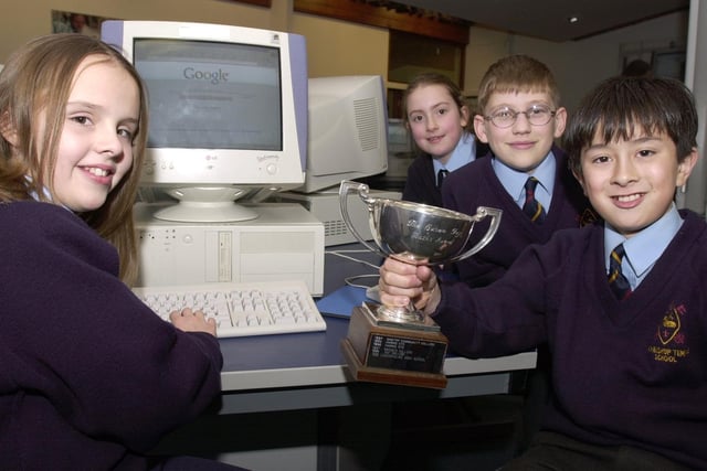 Archbishop Temple High School Fulwood, has won a Technology Trust Award for mathematics. Pictured with the trophy, are, from left, Susan Rodger, Charlotte Adams, Chris King, and George Howarth