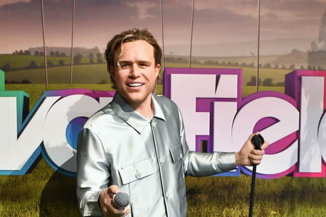 A waxwork of singer Olly Murs decked out in his new clothes