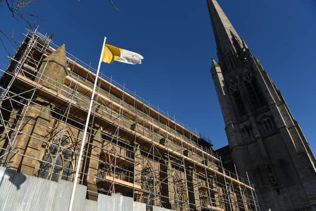 Scaffolding at St Walburge's, Preston. The church, famous for its towering spire, has a leaking roof, with damp evident inside the building, according to Historic England. The register goes on to say that "extensive repairs are still needed".