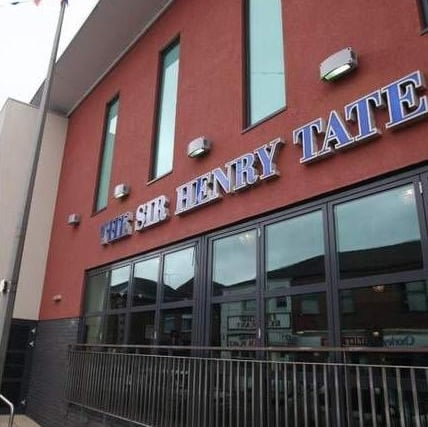 Sir Henry Tate was a sugar magnate and baronet born in White Coppice in 1819. At 13, he became a grocer's apprentice in Liverpool and set up his own shop seven years later.His business was so successful that it expanded into a chain of six stores by the time he was 35.
In 1859, Tate became a partner in John Wright & Co. sugar refinery and sold his grocery business two years later. Gaining complete control of the company a decade after becoming partner, he renamed it Henry Tate & Sons, later purchasing the patent from German Eugen Langen for making sugar cubes and building two further refineries.
Known for his concern with workers’ conditions, he built the Tate Institute opposite his Thames Refinery, with a bar and dance hall for his employees' enjoyment.
Becoming a millionaire, he donated his collection of 65 contemporary paintings to the government for display in a new art gallery, which is today known as Tate Britain, and was opened in 1897.
Pictured is the Sir Henry Tate Wetherspoons pub in Chorley, which was named after him in 2006.
