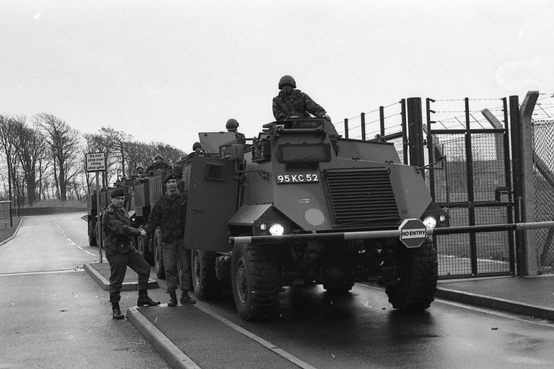 Military hardware, worth the best part of £1m, has rolled into Lancashire on the latest leg of a journey to the front line. The 10 Saxon armoured personnel carriers which arrived at Weeton Camp, near Preston, will be used to train soldiers for their role in a conventional war in Europe. Pictured: Captain Eric Smith (left) welcomes the vehicles at the gate of Weeton Camp
