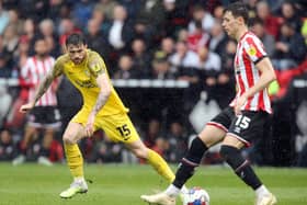 Sheffield United's Anel Ahmedhodzic under pressure from Preston North End's Troy Parrott