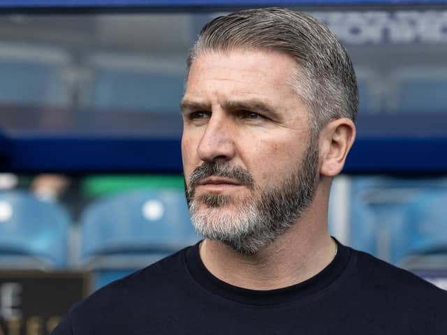 Preston North End's manager Ryan Lowe looks on before the match