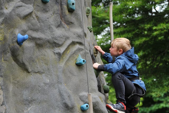 Jettson Pickering, eight, has fun on the climbing wall
