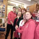 The Duchess of York Sarah Ferguson with volunteers at the lunch club at St Matthew's Church in Burnley during her tour of the borough yesterday