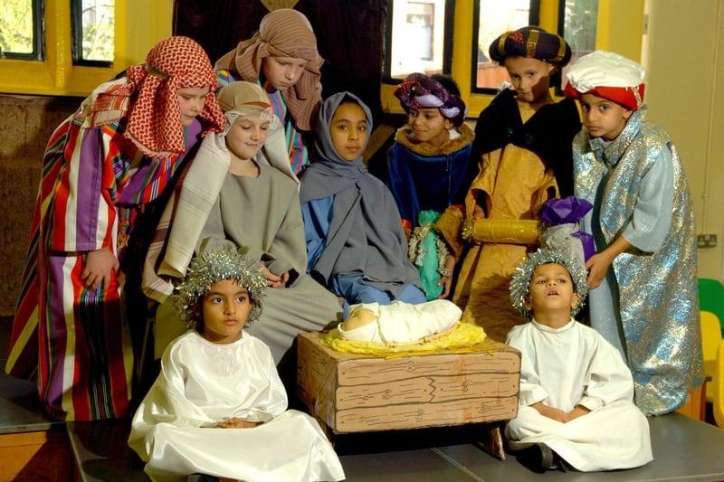 The three wise men and shepherds visit Mary, Joseph and baby Jesus in the traditional Nativity presented by St Ignatius Primary School
