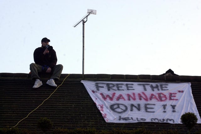Yate's head chef, Danny Byrne, protests from the roof of Yate's in Preston for the release of the 'Wannabe One'