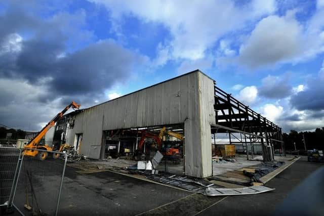 Damage to the dealership was so severe that the building has had to be partially demolished and is currently being rebuilt