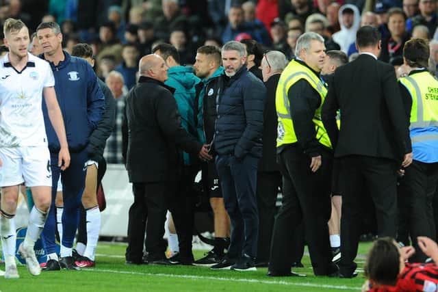 Preston North End manager Ryan Lowe looks on after trouble broke out between him and Swansea City's Joe Allen