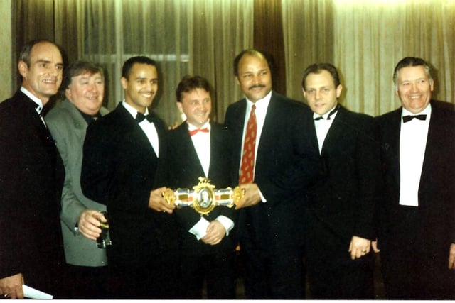 Retro reader Frank Smith sent in this photo the Preston and District League, from the 1990's.  
Walton-le-Dales Sportsmans Dinner held in Leyland with their committee, Frank Smith from the P&DL, Paul Burke the Preston boxer, George Roper comedian second from left, and John Conteh ex world boxing champion, third from right