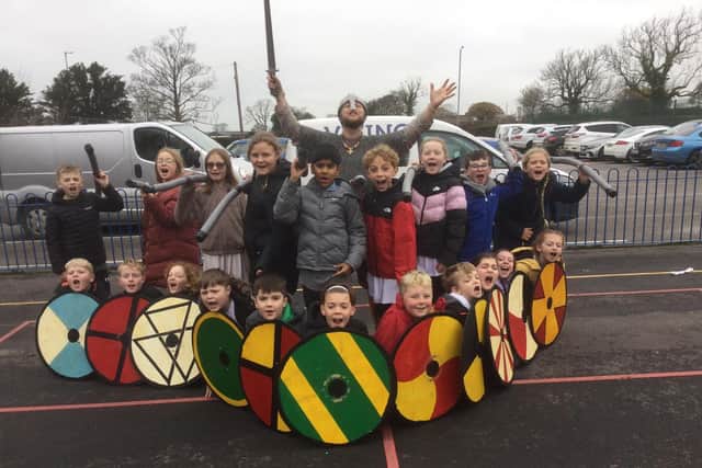 The school's curriculum and activities outside the curriculum were praised. Pictured: Year 5 enjoying a day learning about Anglo Saxon traditions.