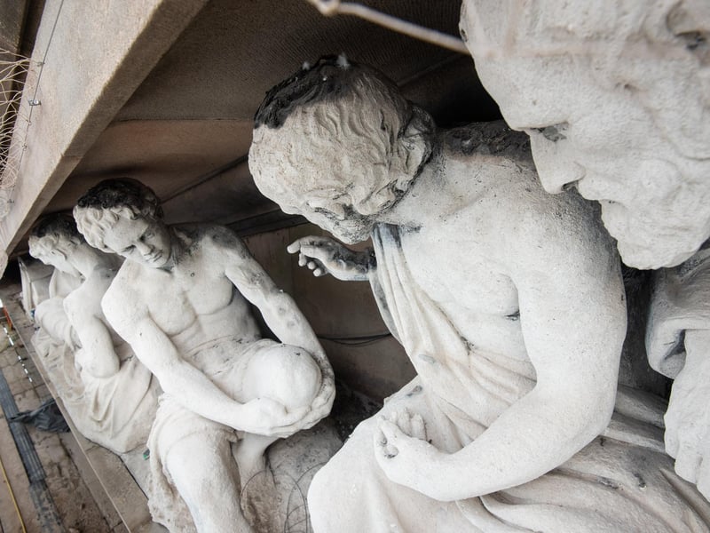 The statues are a representation of the "School of Athens " mural that was painted in the Vatican in the early 1500s