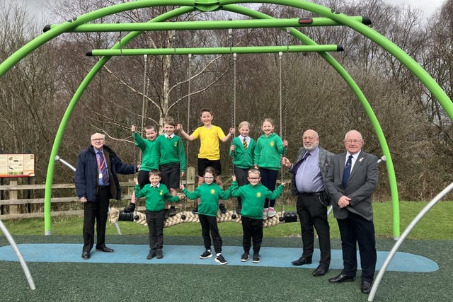 Pupils from Euxton Primrose Hill Primary School helped Chorley Councillors officially unveil the newly revamped Milestone Meadow Play Area on Tuesday