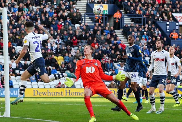 Preston North End striker Sean Maguire heads the ball back for Tom Barkhuizen to score against Blackburn Rovers at Deepdale
