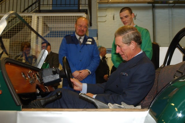 Prince Charles tries the Locost sports kit car during the visit by HRH the Prince of Wales to Wymott Prison at Ulnes Walton near Leyland in 2003