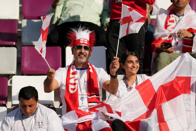 England fans in the stands before the FIFA World Cup Group B match at the Khalifa International Stadium in Doha, Qatar