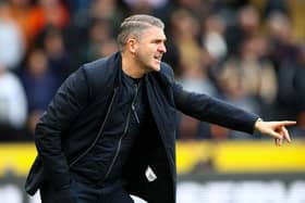 Preston North End manager Ryan Lowe  shouts instructions to his team from the technical area