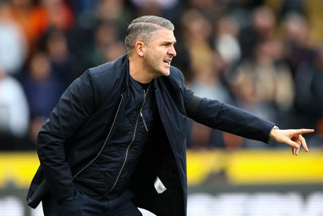 Preston North End manager Ryan Lowe  shouts instructions to his team from the technical area
