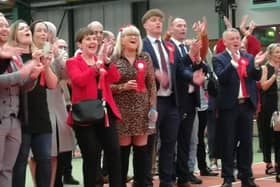Labour supporters and councillors as they learn that the party has won an outright majority