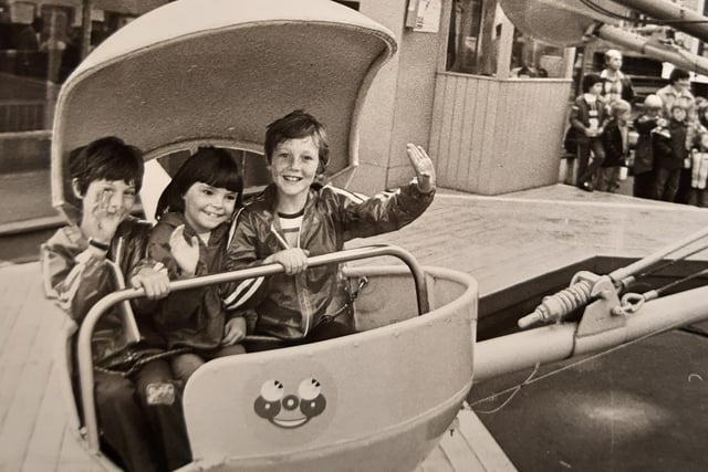 Martin Smethurst, Claire Hutchinson and Mark Smethurst take advantage of free rides in August 1980