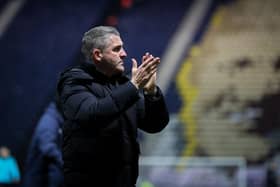 Preston North End manager Ryan Lowe applauds the fans after the match