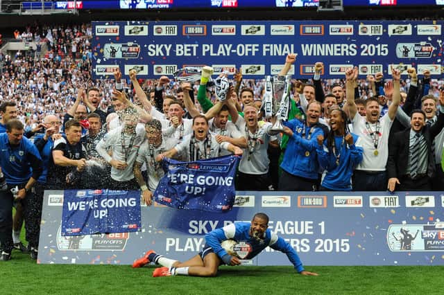 Preston North End celebrate winning the League One play-off final against Swindon Town at Wembley in May 2015