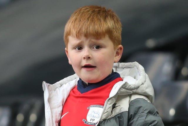A young PNE fan takes in the scenery at Craven Cottage.