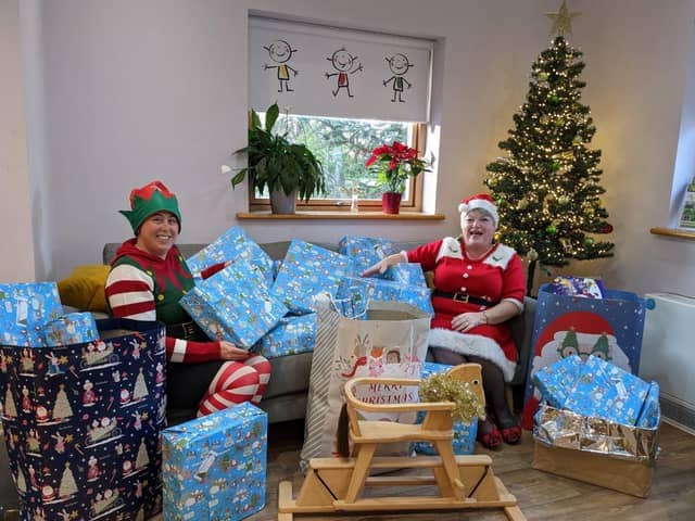 Carol Larn and Rachel De Vere from Persimmon delivering the gifts to Derian House Children’s Hospice. 
