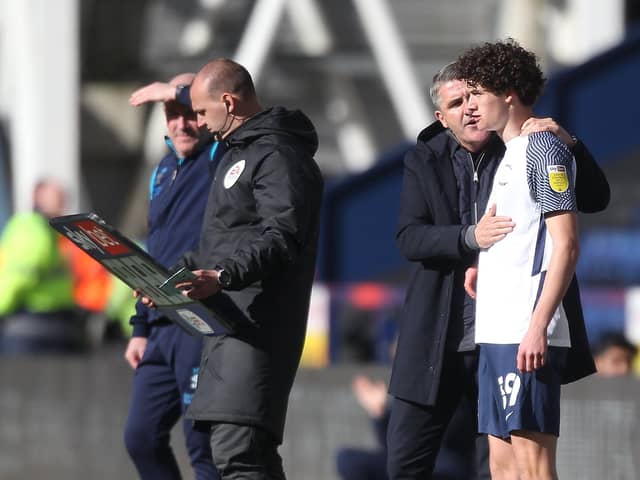Mikey O'Neill prepares to come on for his Preston North End debut against Queens Park Rangers at Deepdale