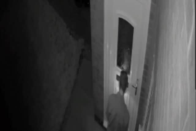 Footage captures the moment a man set fire to a ballot paper before posting it through woman’s letterbox in Blackburn (Credit: Lancashire Police)