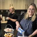 Staff at Westmorland Homecare's Lancaster and Morecambe branch preparing for the coffee afternoon